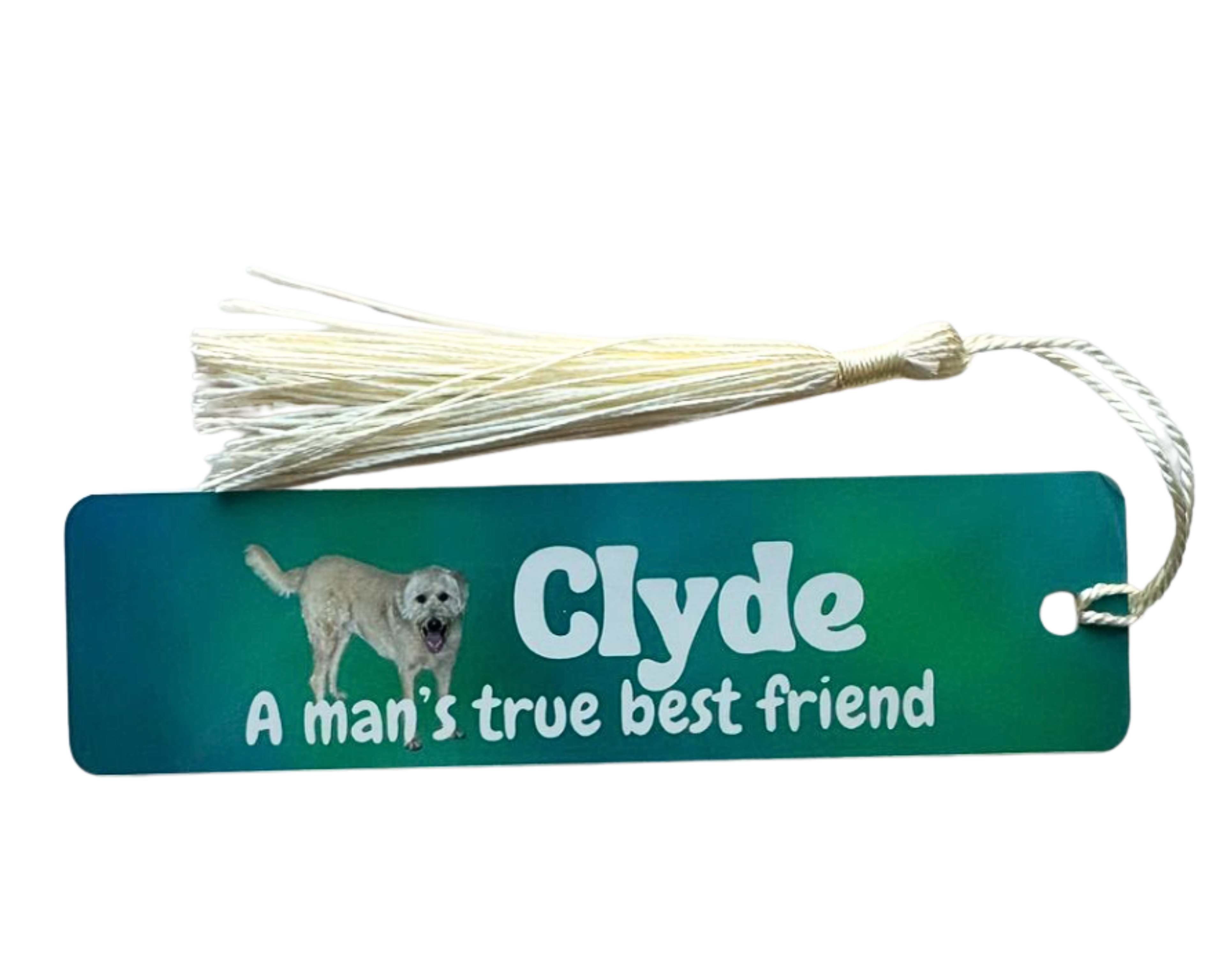 Bookmark with tassel featuring a dog illustration and text on a white background